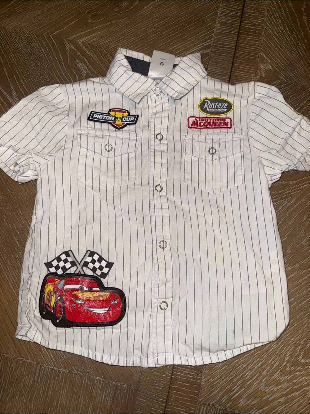 This Lightning McQueen Snap Button Up Shirt in size 4 Disney